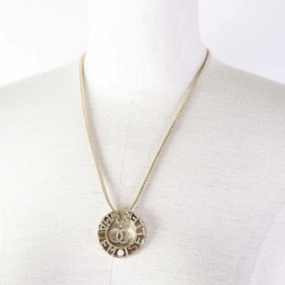 CHANEL Gold Logo Necklace - Picture 3 of 9